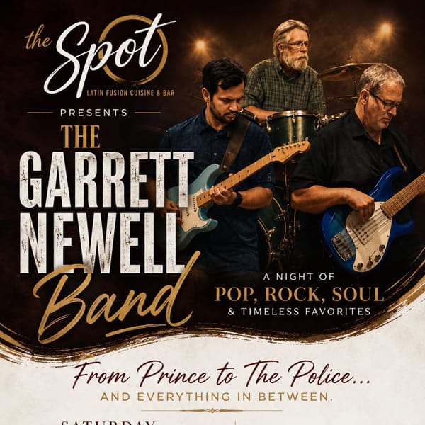 Three male musicians of The Garrett Newell Band play guitar, bass, and drums at The Spot.