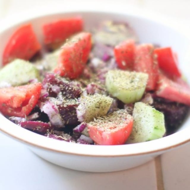 Cucumber, Beet, and Tomato Vinaigrette Salad.
